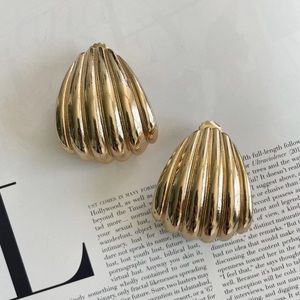 Statement gold earrings